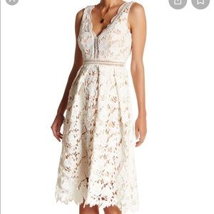 Romeo & Juliet Couture double-v lace midi dress